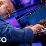 Julian Joseph playing piano.