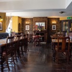 Inside The Broadfield, with its traditional pub decor.