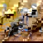 Homely Apartments – Figtree living room with bright interior, stylish furnishings, and inviting atmosphere.