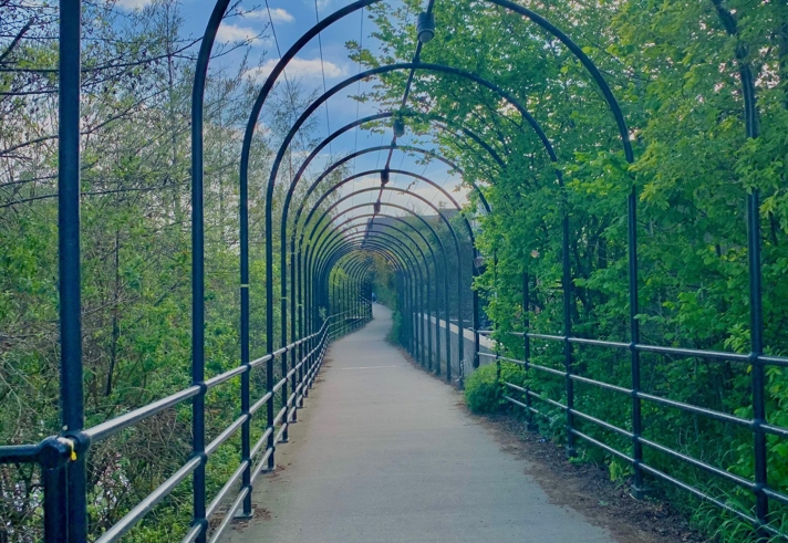 Five Weirs Walk bridge on a sunny day.