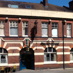 The exterior of The Grapes.