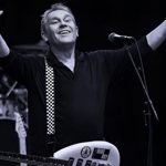 A black and white photo of the band The Beat.