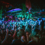 People dancing in a crowded nightclub.