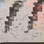 A pencil drawing of a face and a photo that is the source material for the drawing.