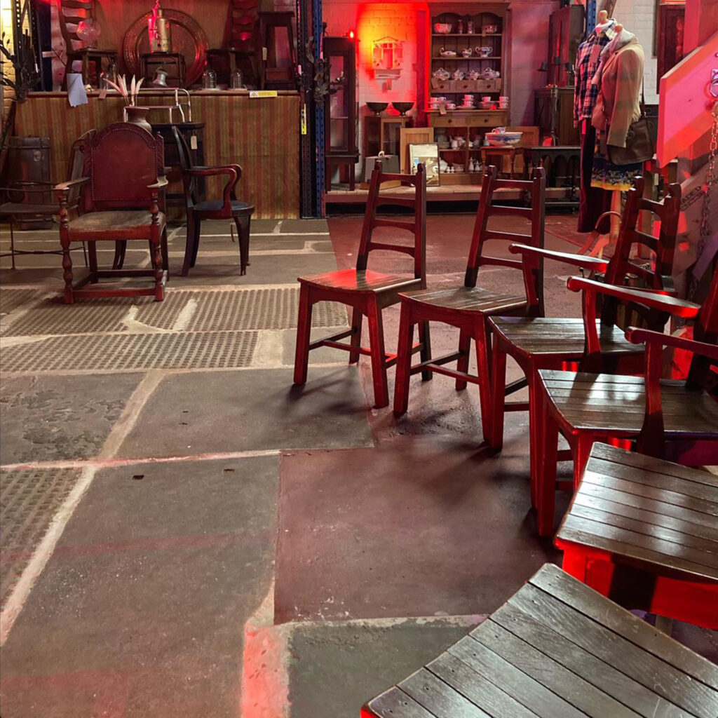 A row of six vintage matching chairs for sale at The WareHouse.