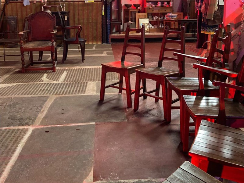 A row of six vintage matching chairs for sale at The WareHouse.