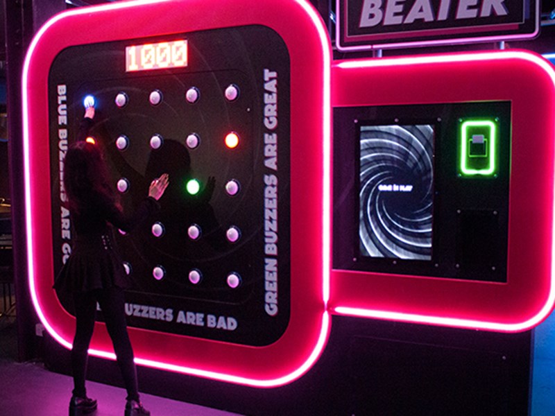 A person playing one of the games at Gameshow All Stars.