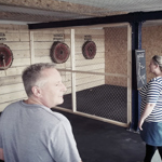 People having fun at Valhalla Axe Throwing.