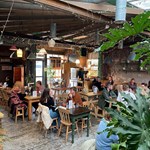 Inside The Old Workshop, filled with customers.