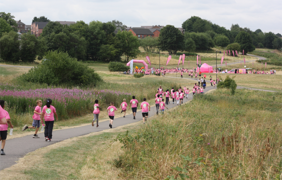 A charity run taking place in Manor Fields Park.