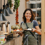 Food being carried to a table at Marmadukes - The Sorting Office