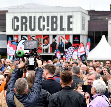 Tudor Square, in Sheffield city centre, is thronging with people, who have come to watch the snooker at The Crucible.