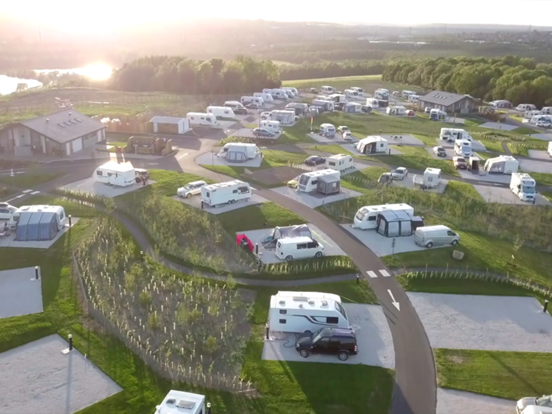 Aerial view of Waleswood Caravan and Camping Park showing caravans, camping pitches, and surrounding countryside.