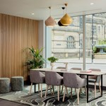 Reception area with table and chairs.
