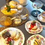 Various cakes and desserts on display.