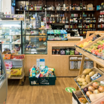 The Green Shop filled with produce for sale.