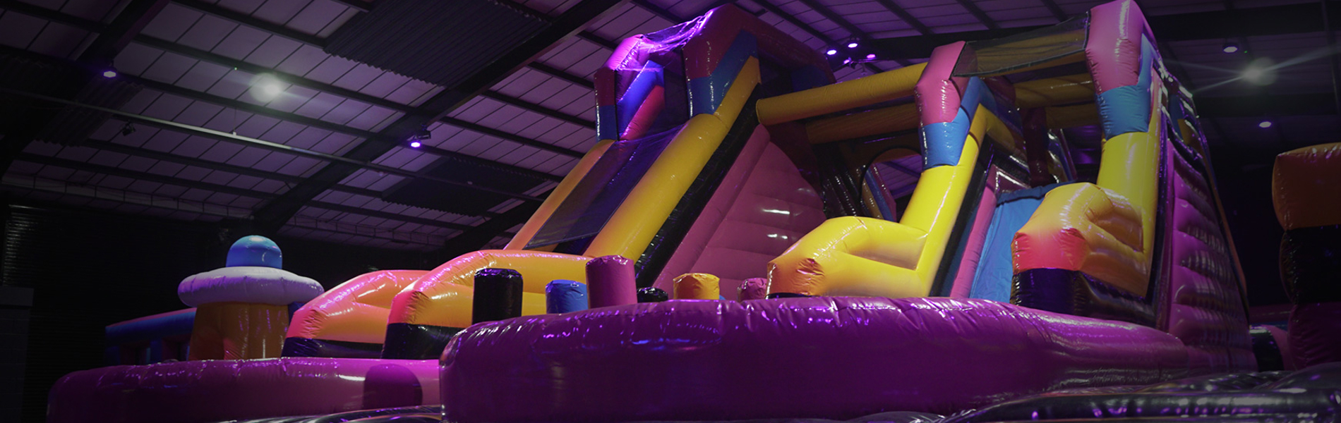 A row of huge slides at Air Haus.