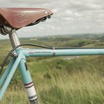 Close up of the seat and cross bar on a classic road bike.