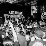 A black and white photo of a concert at The Lughole.