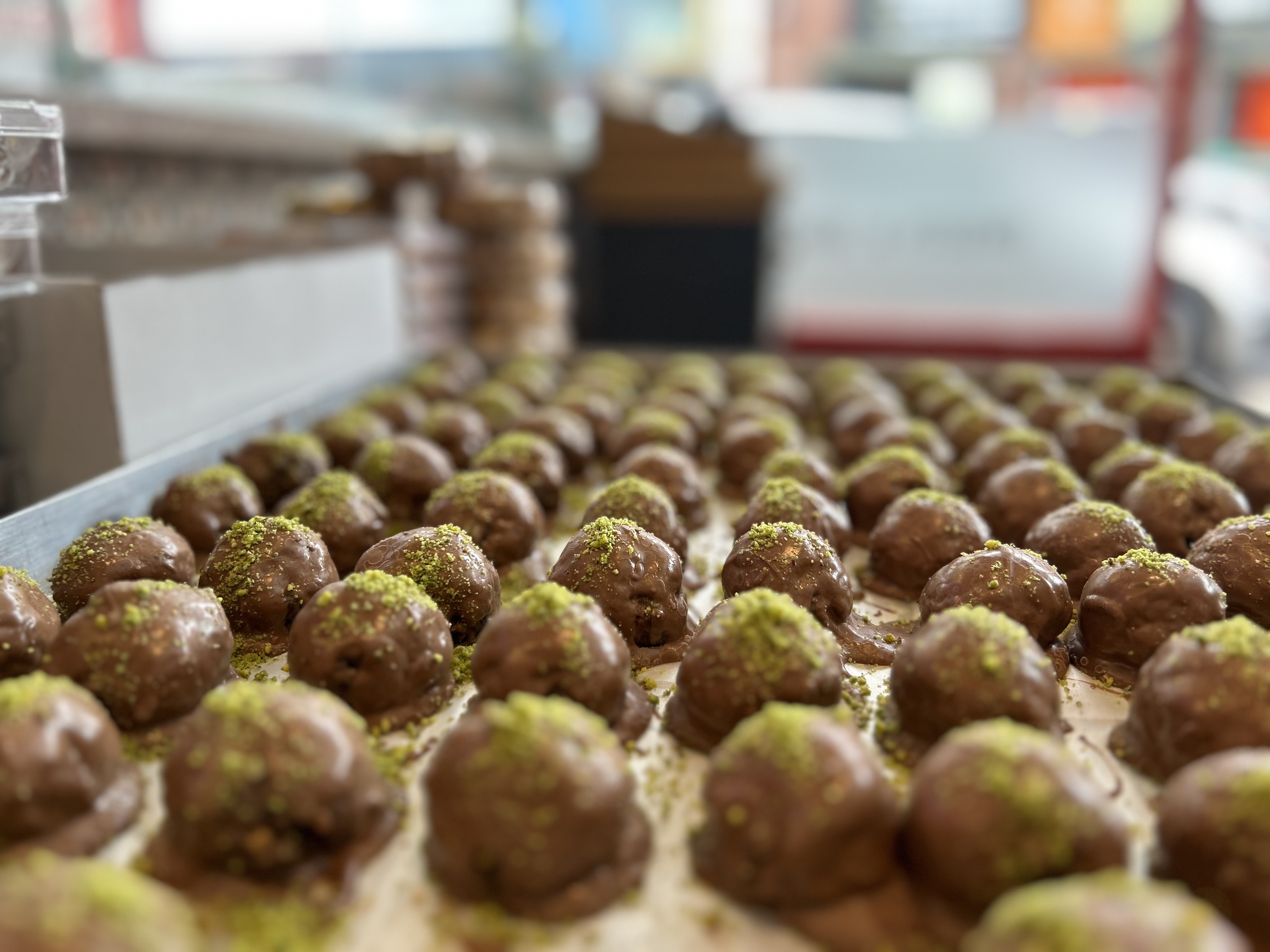 a close of the pistachio and chocolate ball dessert 