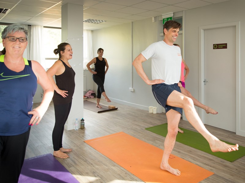 People in a yoga class.