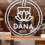 The window, with logo, at the Dana Cafe.
