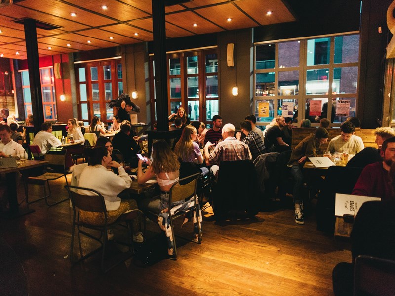 Bungalows & Bears at night, full of customers.