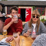 People drinking outdoors at The Brewery of St Mars of the Desert.