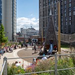Pound's Park full of people enjoying the sunshine.