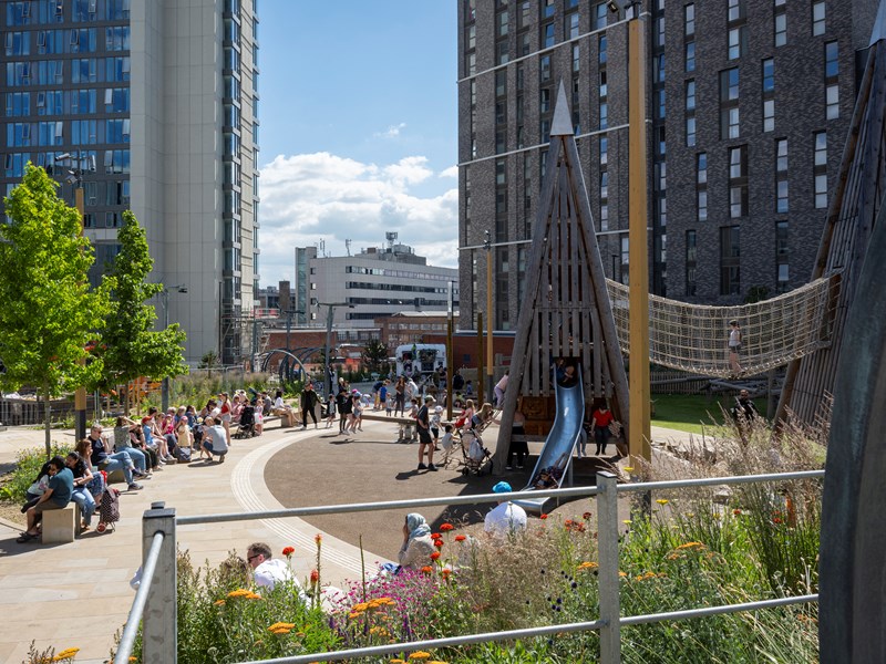 Pound's Park full of people enjoying the sunshine.