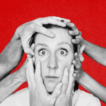 A close-up of a person's head with three pairs of hands pressed against it. The person is looking slightly startled and a little uncomfortable.