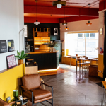 The bright and cheerful interior of the Front Room.