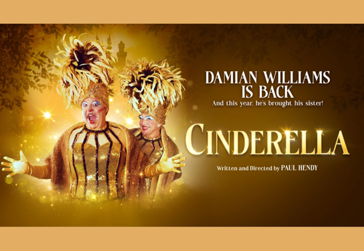 Poster for the event featuring Damian Williams dressed as a panto dame, in a sparkling gold number with a magnificent feathered hat. 