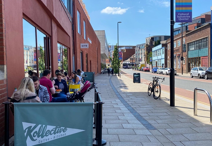 Outdoor seating at the front of Kollective Kitchen.