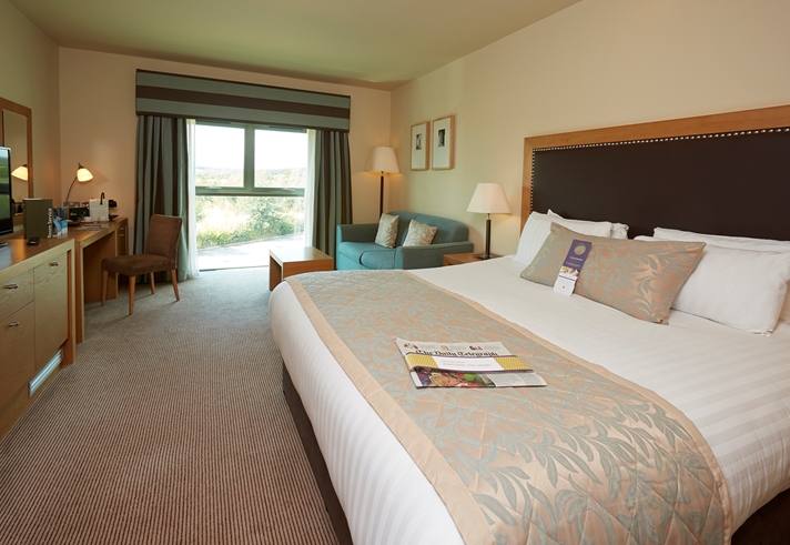 Spacious hotel room featuring a double bed, bedside tables, and contemporary furnishings at Mercure Sheffield Parkway Hotel.”