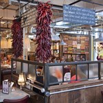 The interior of Bill's with huge bundles of dried chillies hanging from the ceiling.