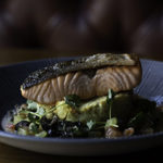 A dish of cooked salmon.