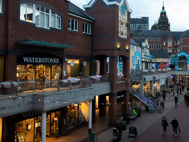 The exterior of Waterstones at dusk.