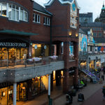 The exterior of Waterstones at dusk.