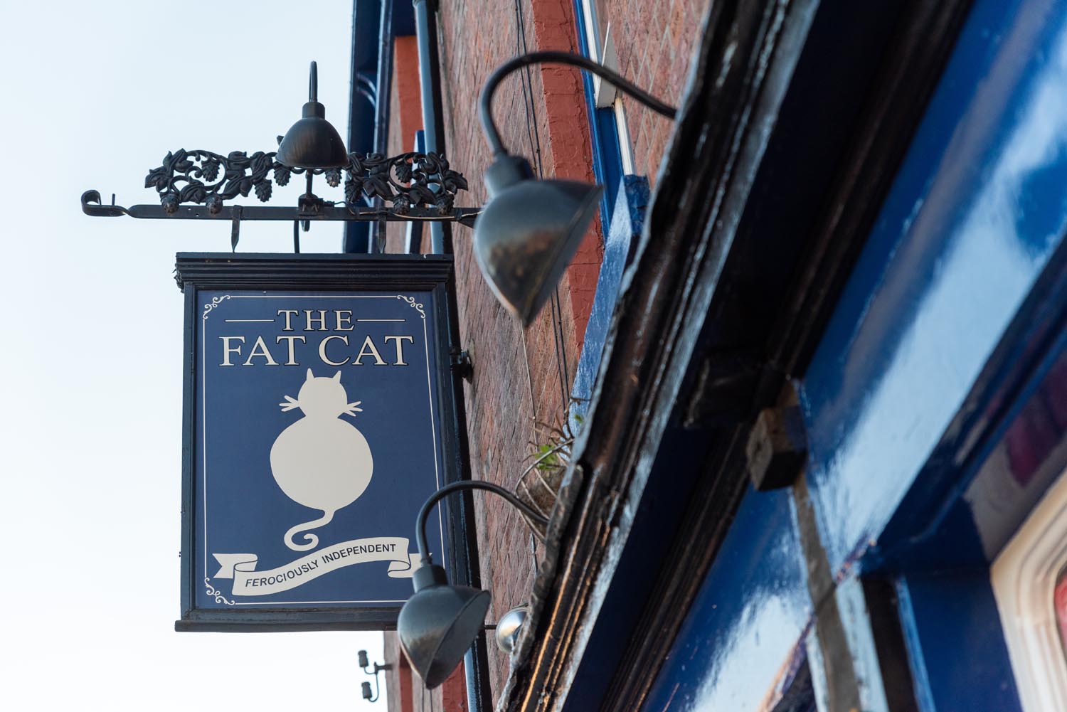 The pub sign hanging outside The Fat Cat.