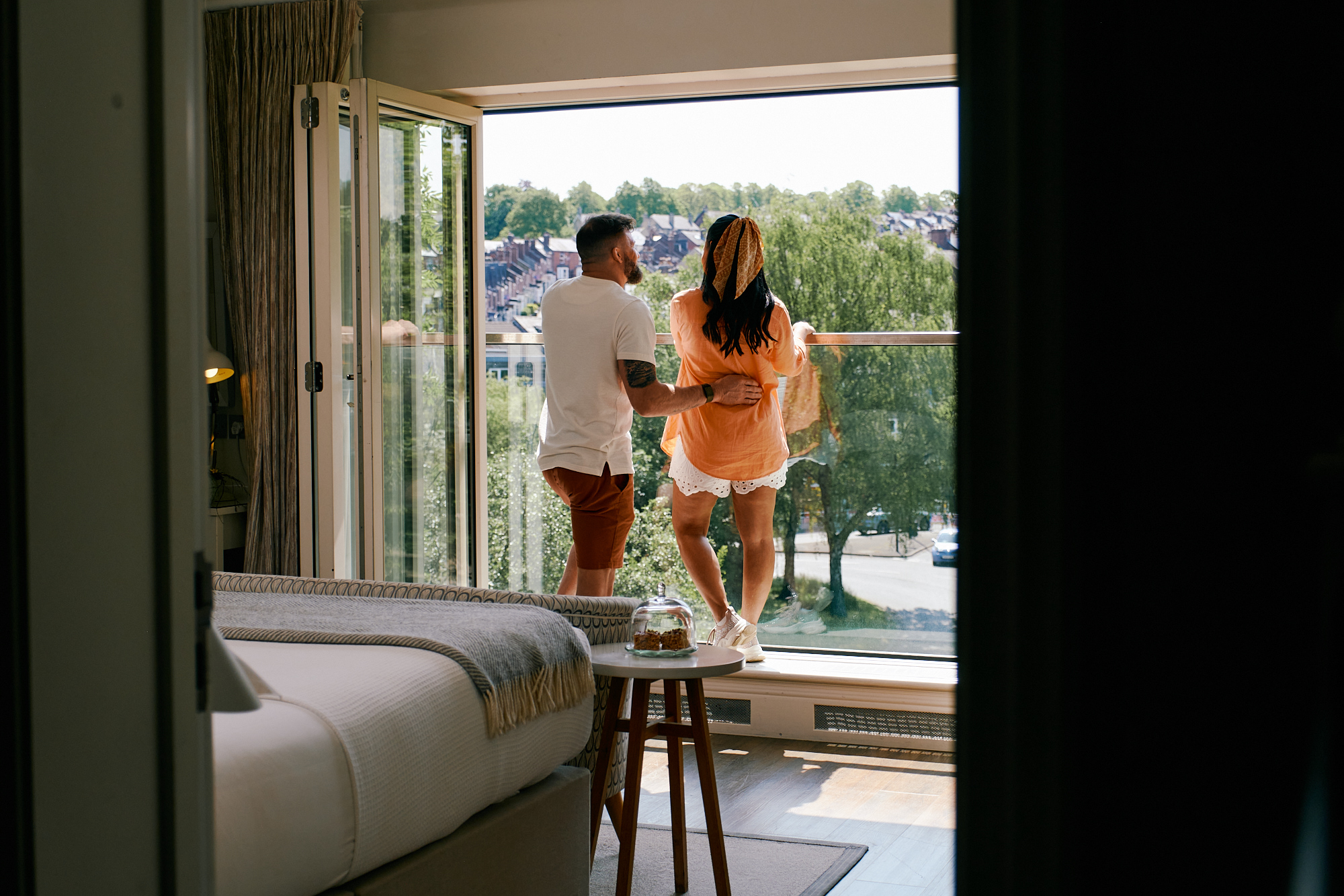 Couple admiring the view from Brocco on the Park a boutique hotel in Sheffield 