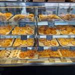 A glass case full of baked goods at Kringle Danish Bakery.