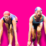 Two people in swimming gear crouched down, ready to start a race, against a bright pink background.
