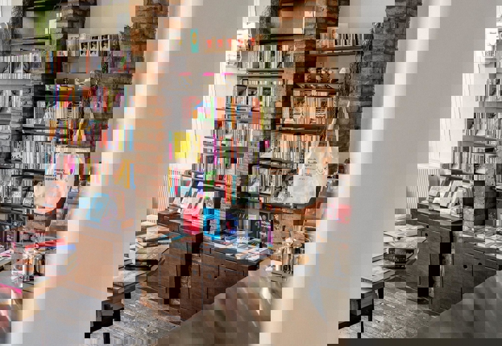 Shelves full of books at a book shop.