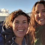 Two people out in the countryside.