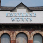 The sign high up above the entrance to Portland Works.