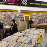 People browsing through the stalls at a record fair set up in the Moor Market.