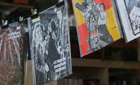 Rows of shelves and racks full of books and records at Kelham Books & Music.
