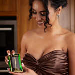 A woman holding some Jasmine's Jamaican Rum Cake.