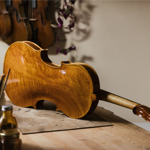 A violin on a workbench at Hardy Violins.